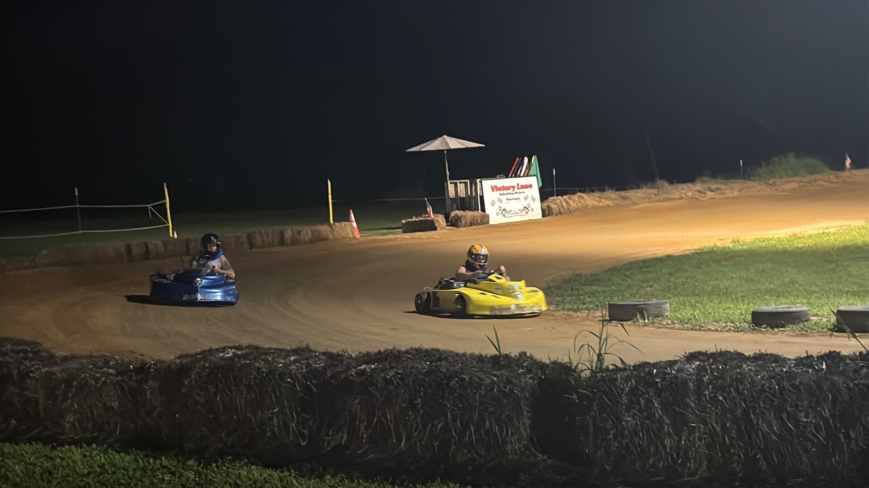 The 10X and the 3 racing side by side under the lights at Adjoining Hearts Raceway